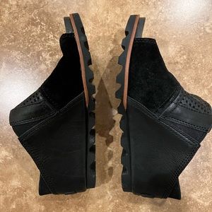 Sorel slip on sandals.